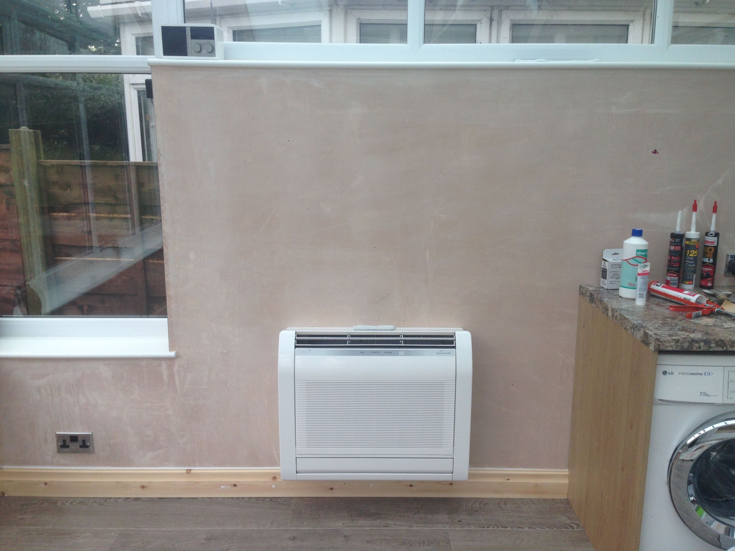 Air conditioning unit installed on a wall