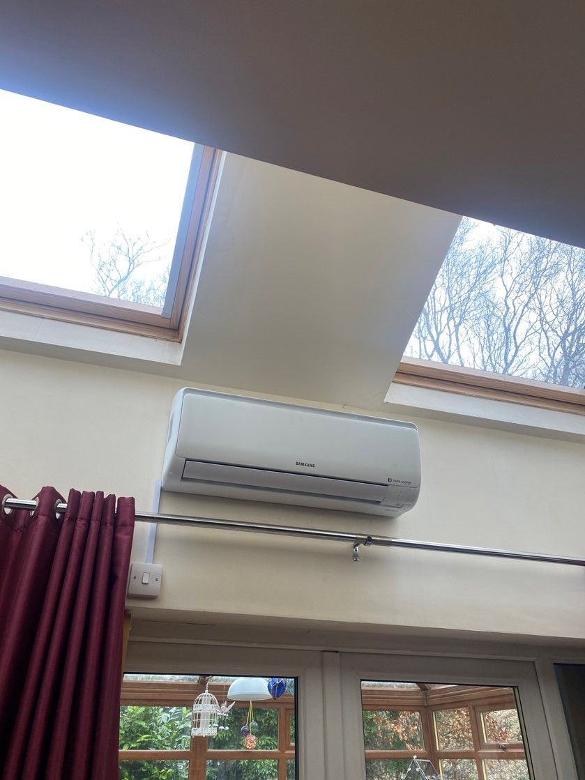 an airconditioning unit installed on a wall