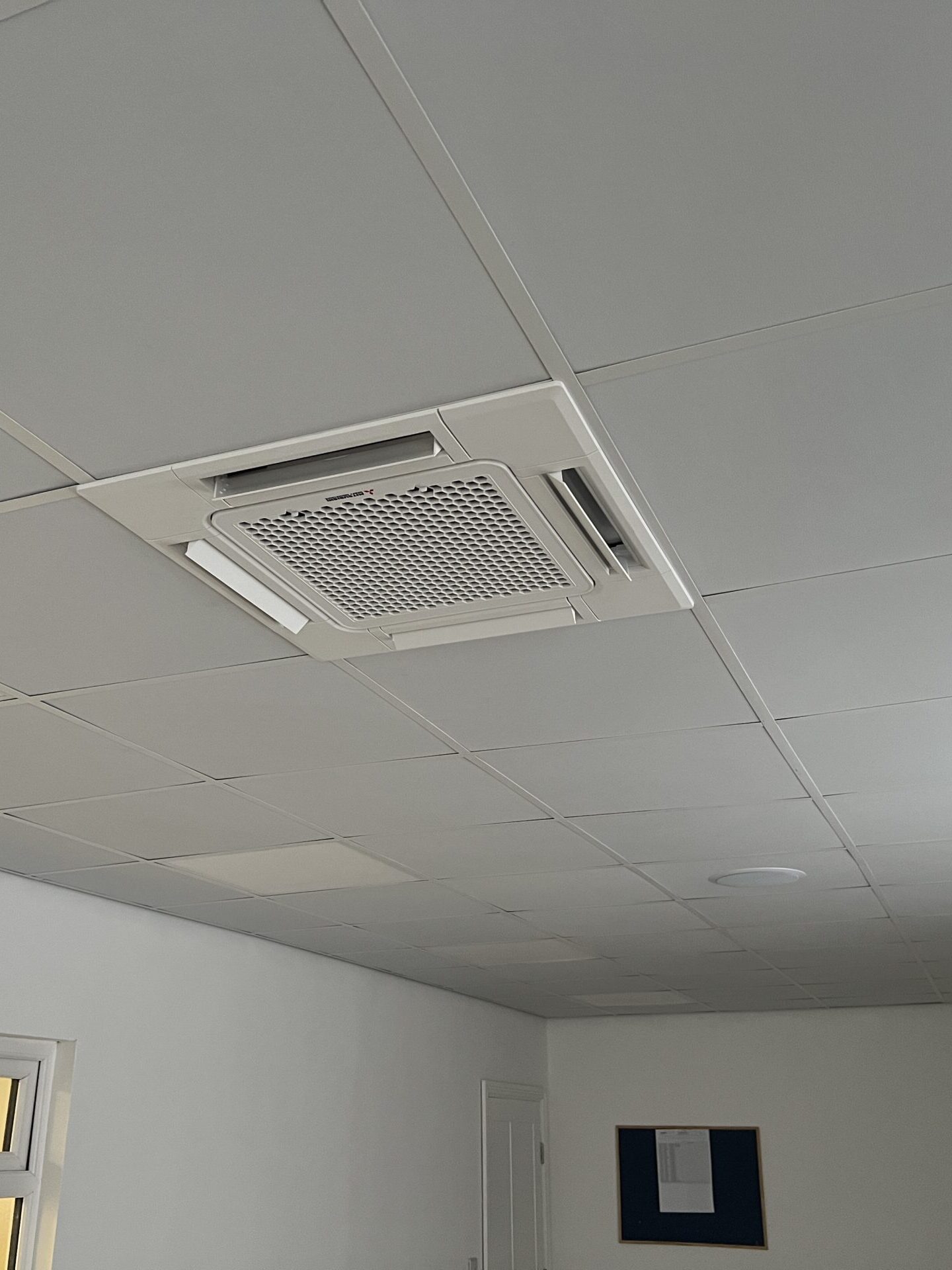 external picture of an airconditioning unit installed on a wall